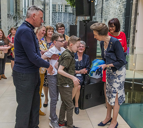 Princess Anne being presented with the official RDA Tartan