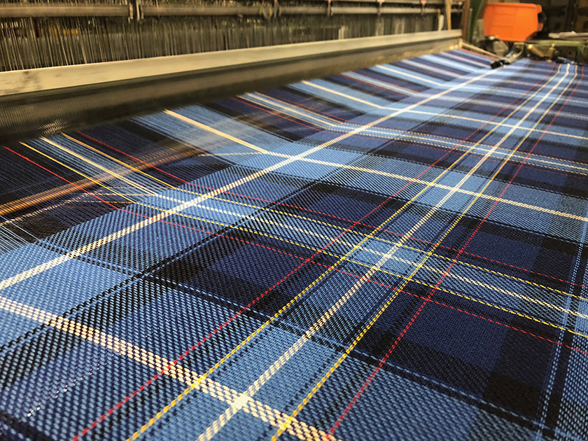 Blue, Red and White Tartan weaving on loom